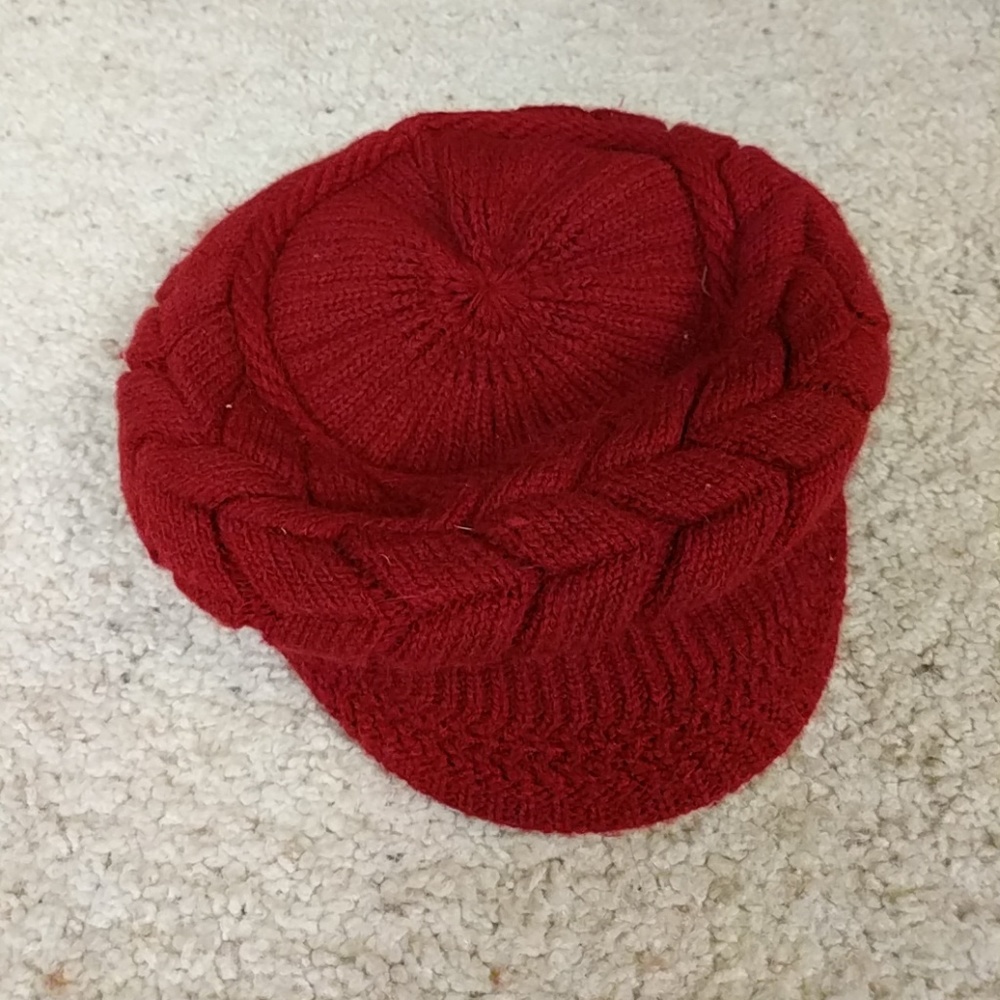 Red knit hat with faux fur lining